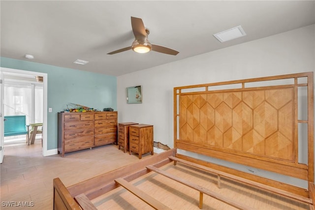 bedroom with ceiling fan and visible vents