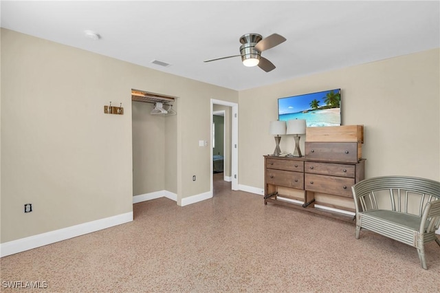 bedroom featuring a closet, visible vents, a ceiling fan, baseboards, and speckled floor