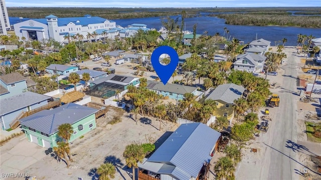 aerial view featuring a residential view and a water view