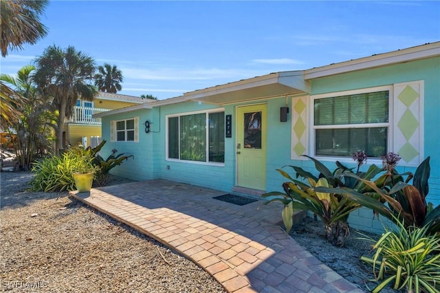 view of front of house with a patio