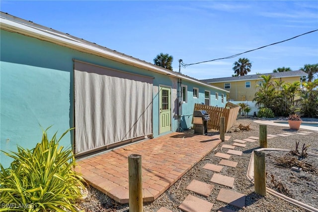 view of patio with fence