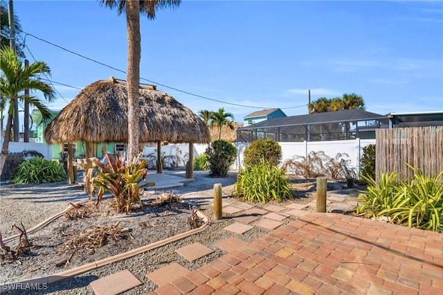 view of patio with a gazebo and a fenced backyard