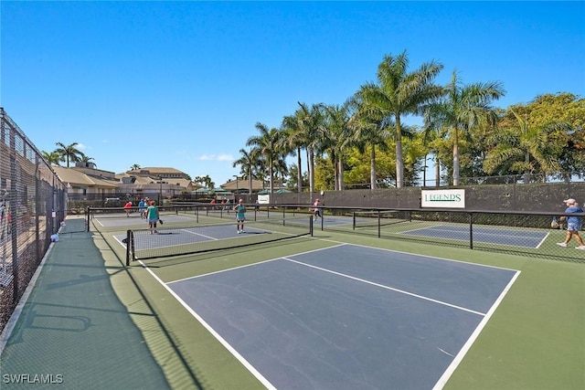 view of sport court with basketball hoop