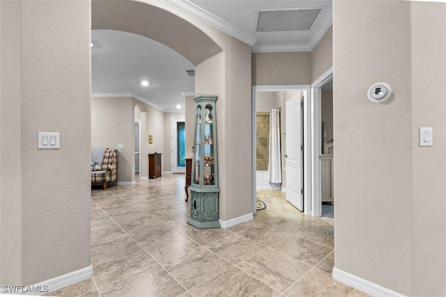 hallway featuring crown molding