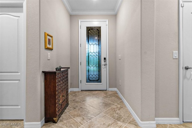 foyer entrance with light tile patterned flooring and ornamental molding