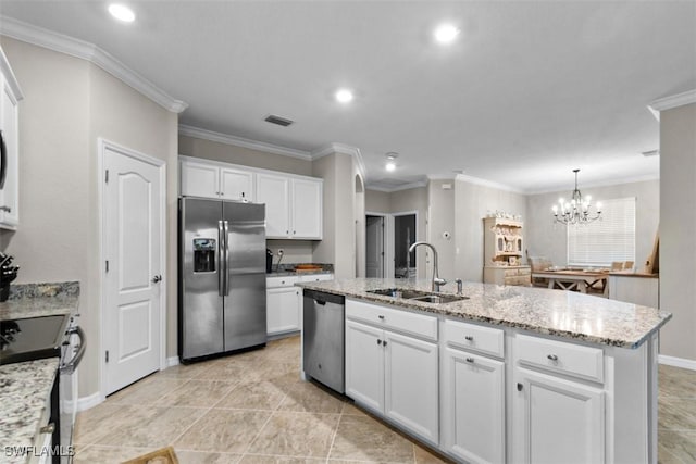 kitchen featuring white cabinetry, sink, stainless steel appliances, an inviting chandelier, and ornamental molding