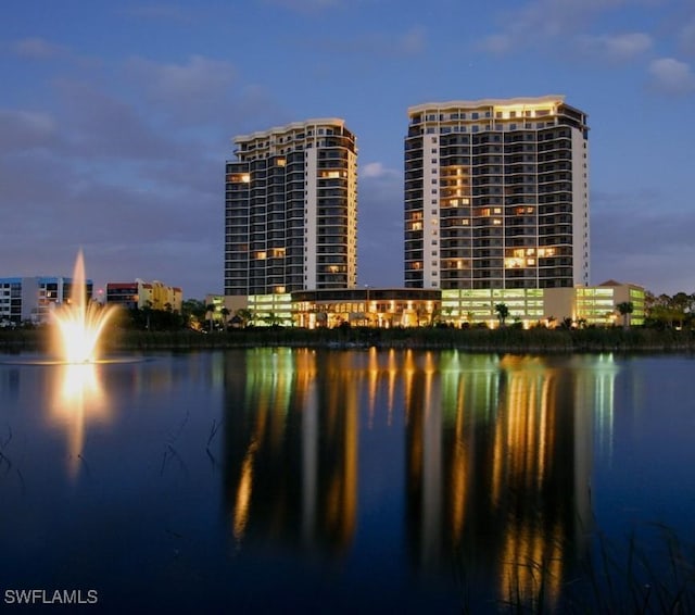 property's view of city featuring a water view