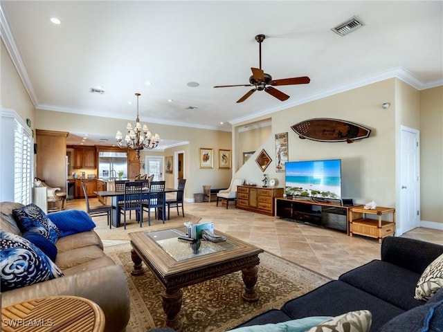 living room featuring ceiling fan with notable chandelier, crown molding, and a wealth of natural light