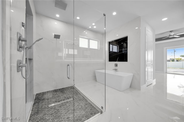 1027 NW 40th Pl, Cape Coral, FL 33993 - bathroom with recessed lighting, a freestanding tub, a marble finish shower, and ceiling fan