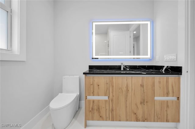 1027 NW 40th Pl, Cape Coral, FL 33993 - bathroom featuring vanity and toilet