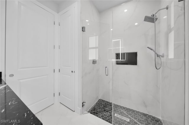 1027 NW 40th Pl, Cape Coral, FL 33993 - bathroom with a marble finish shower