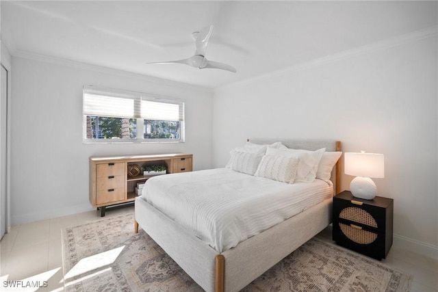 bedroom with ceiling fan, light tile patterned floors, and crown molding