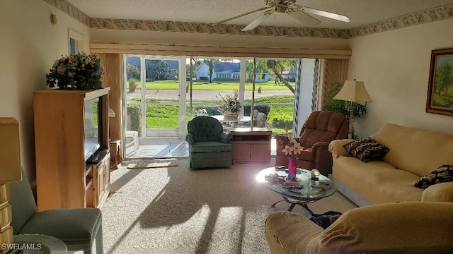 interior space with carpet, ceiling fan, and a healthy amount of sunlight