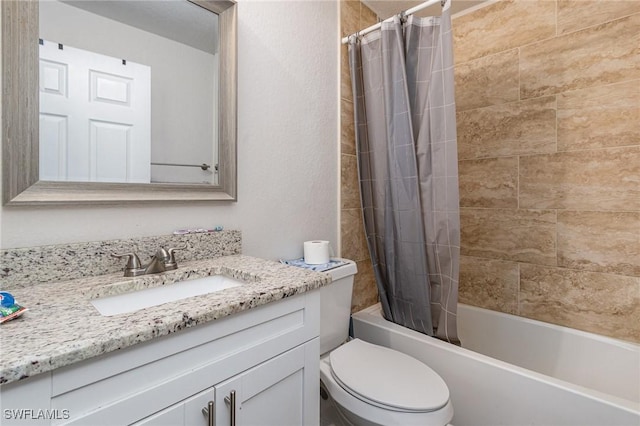 full bathroom with shower / bath combo, toilet, and vanity