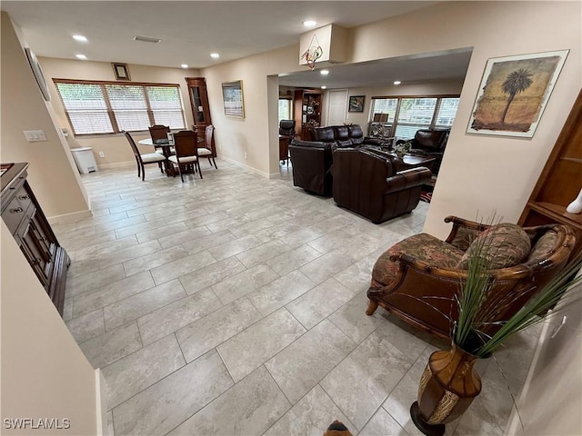 living room featuring a wealth of natural light