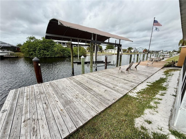 dock area with a water view