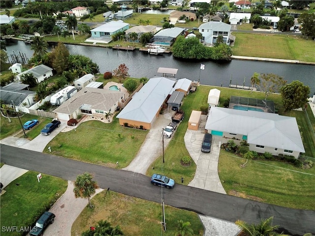 drone / aerial view featuring a water view