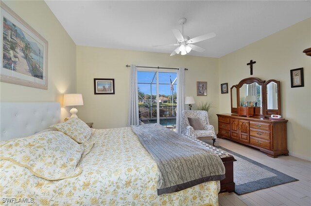 bedroom with access to exterior, ceiling fan, and light hardwood / wood-style floors