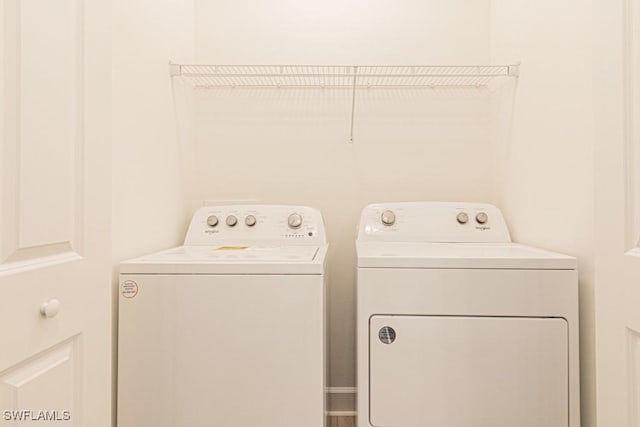 washroom featuring separate washer and dryer