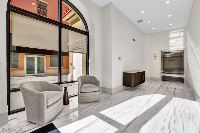 bedroom with a towering ceiling