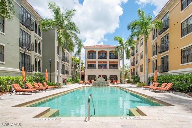 view of swimming pool featuring a patio area