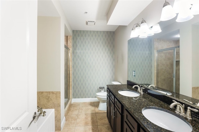 full bathroom featuring vanity, tile patterned flooring, plus walk in shower, and toilet