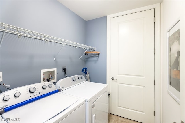 washroom with separate washer and dryer