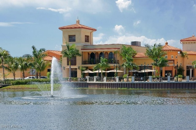 view of building exterior with a water view