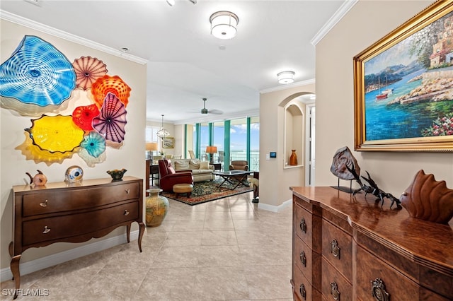 hall featuring crown molding and light tile patterned floors