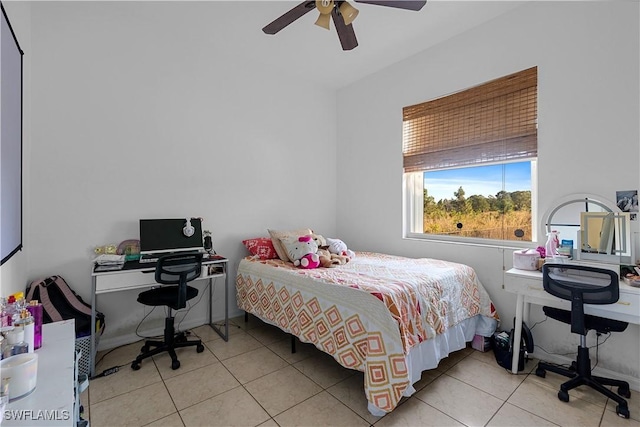 tiled bedroom with ceiling fan