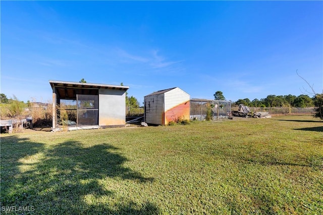 view of yard with a storage shed