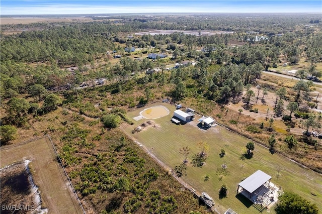 birds eye view of property with a rural view