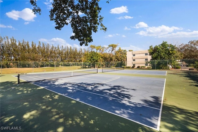 view of sport court featuring basketball hoop