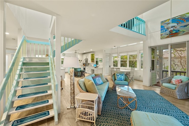 interior space featuring hardwood / wood-style flooring and ceiling fan