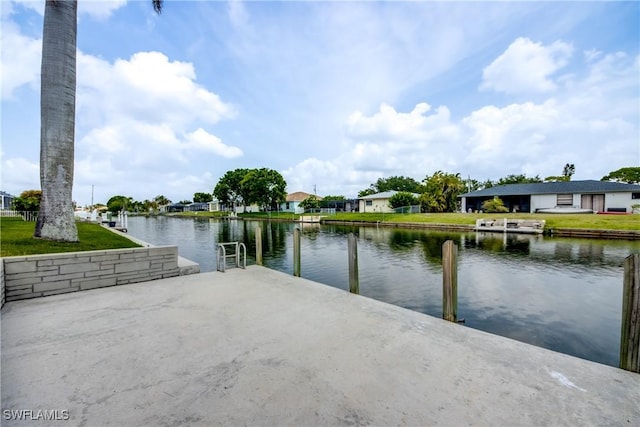 dock area with a water view