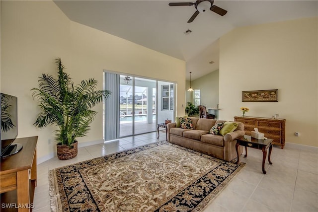 living room with high vaulted ceiling, ceiling fan, and light tile patterned flooring