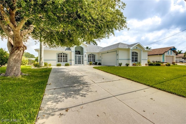 view of front facade featuring a garage and a front yard