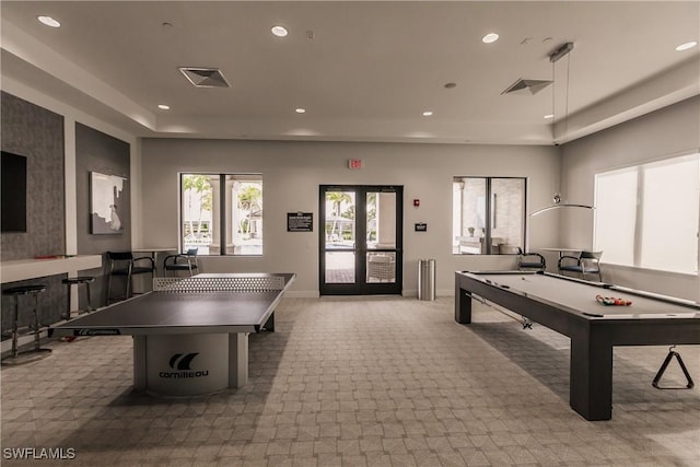 playroom with light carpet, french doors, and pool table