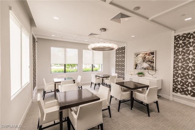 dining area with light carpet