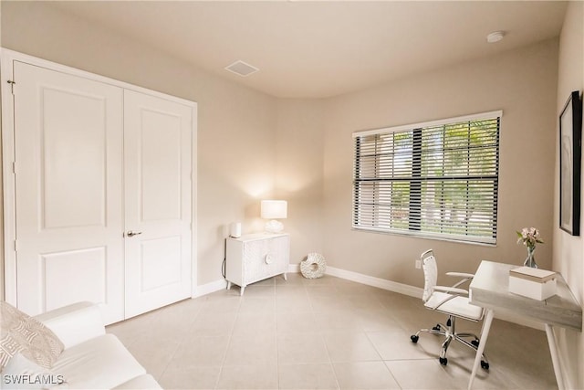 office space featuring light tile patterned floors