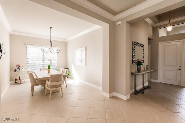 dining area featuring a notable chandelier, light tile patterned flooring, and crown molding