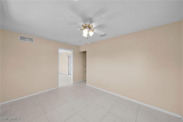 unfurnished room with ceiling fan