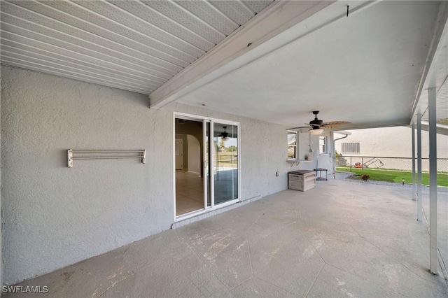 view of patio featuring ceiling fan