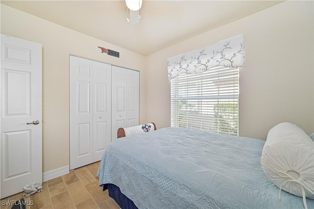 bedroom with a closet and ceiling fan