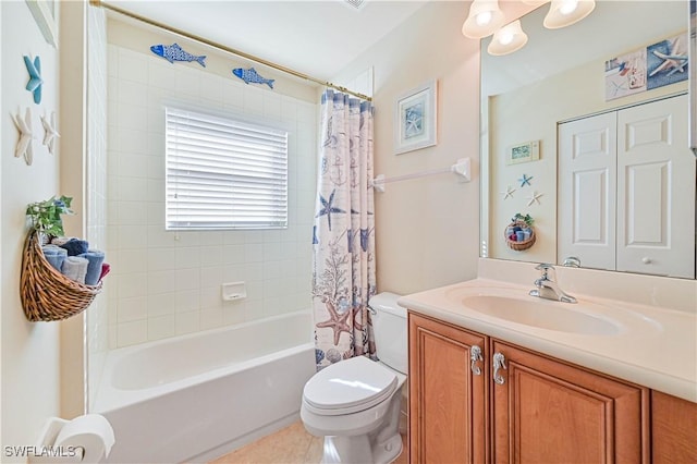 full bathroom with tile patterned floors, vanity, shower / bath combo, and toilet