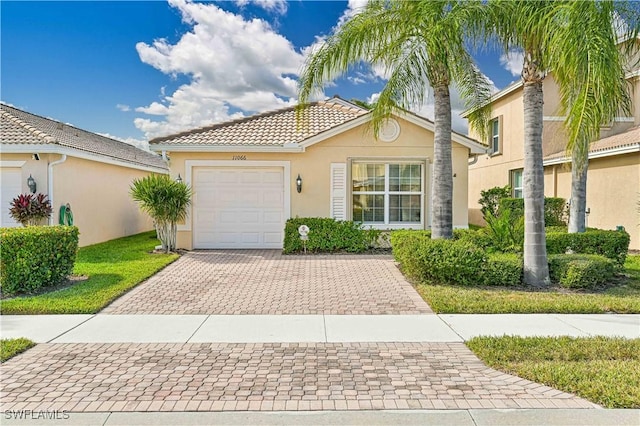 view of front of home with a garage