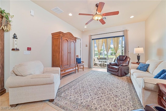 tiled living room featuring ceiling fan