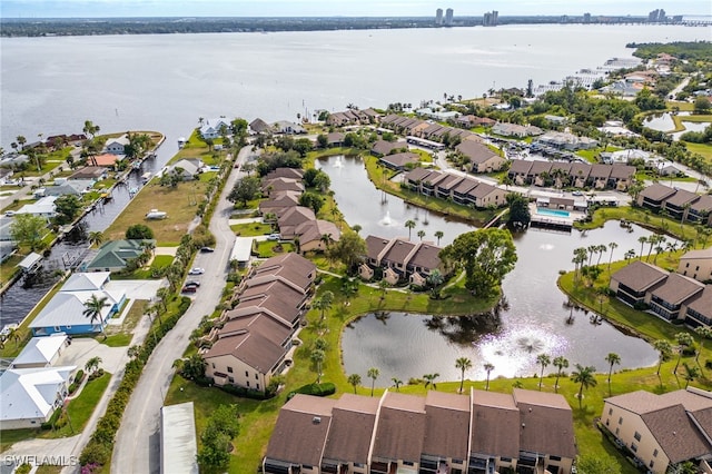 bird's eye view with a water view