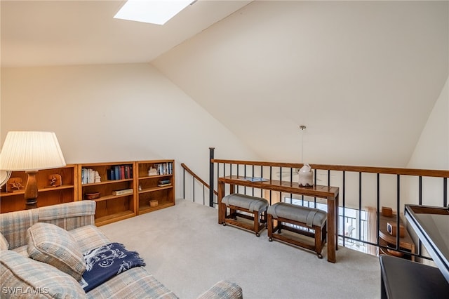 sitting room featuring lofted ceiling with skylight and light carpet