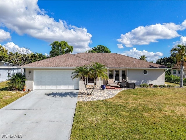 single story home with a front lawn and a garage